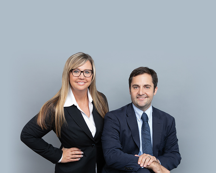 Photo of Samantha Valentine Ellis and Gary T.J. Bryant with a light blue background.